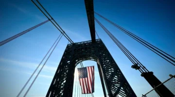 وكالة سكوب تخفض التصنيف الائتماني للولايات المتحدة وتأثير ذلك على الاقتصاد العالمي